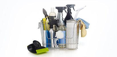 A basket full of cleaning supplies
