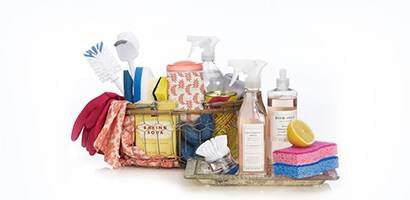 A basket full of cleaning supplies
